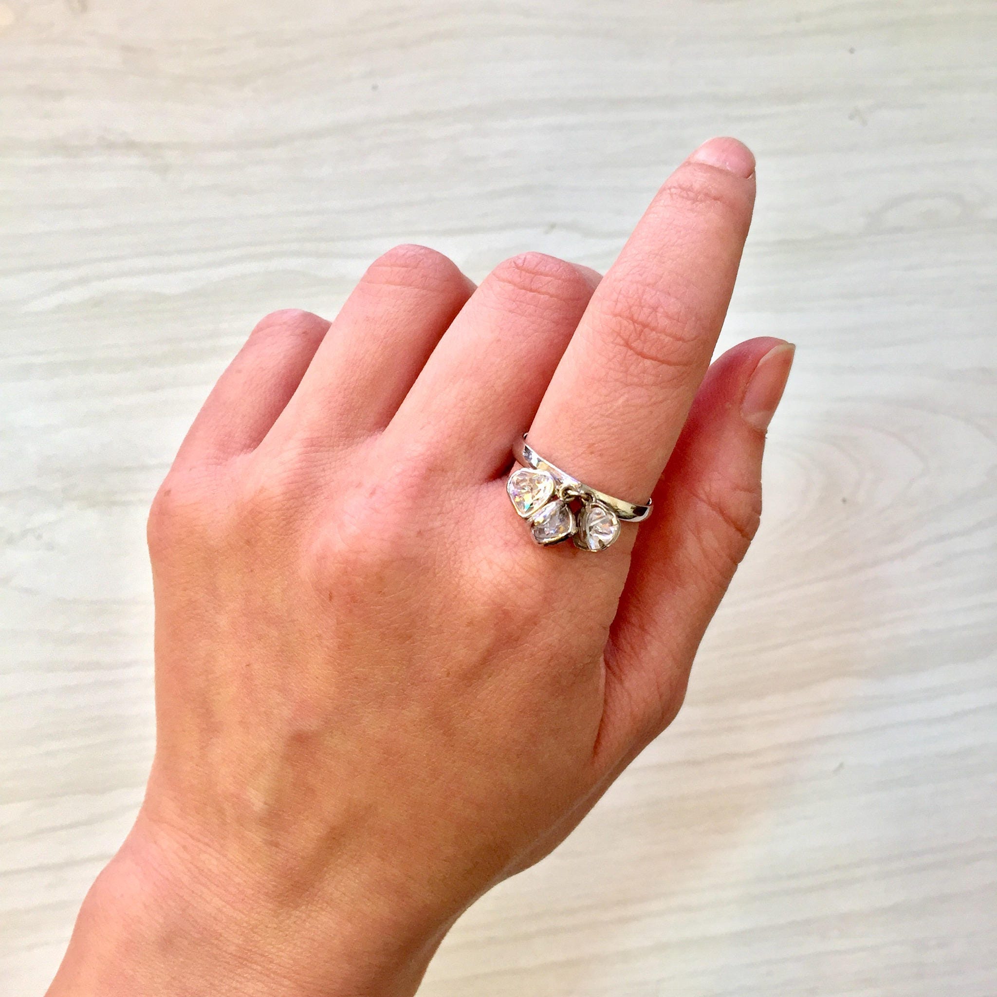 14 karat white gold heart-shaped cubic zirconia ring on hand