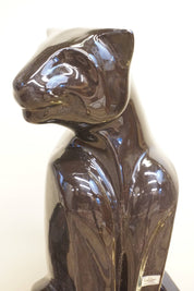 Tall ceramic Royal Haeger panther statue from the 1970s, vintage home decor piece featuring glossy brown glaze.