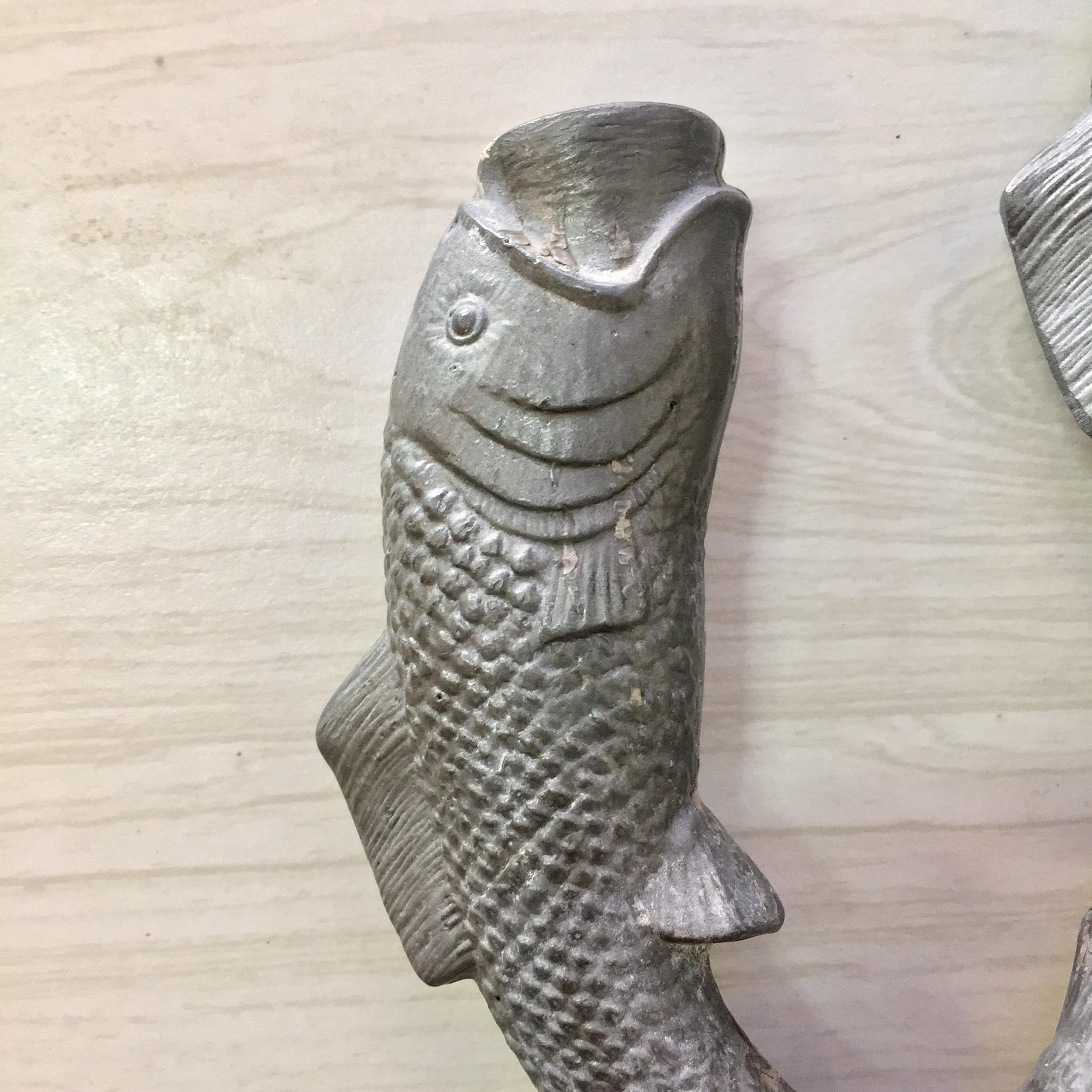 Vintage pewter fish-shaped candlestick holder with intricate scale detailing, perfect for unique home decor, housewarming or holiday gift ideas.