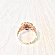Vintage 10K gold lion's head ring with diamond accents, featuring intricate detailing and a striking statement design from the retro era.