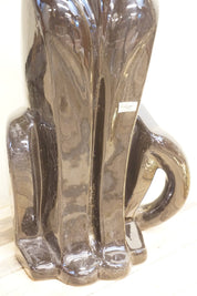 Tall ceramic Royal Haeger panther statue from the 1970s in dark brown glaze, vintage home decor piece.