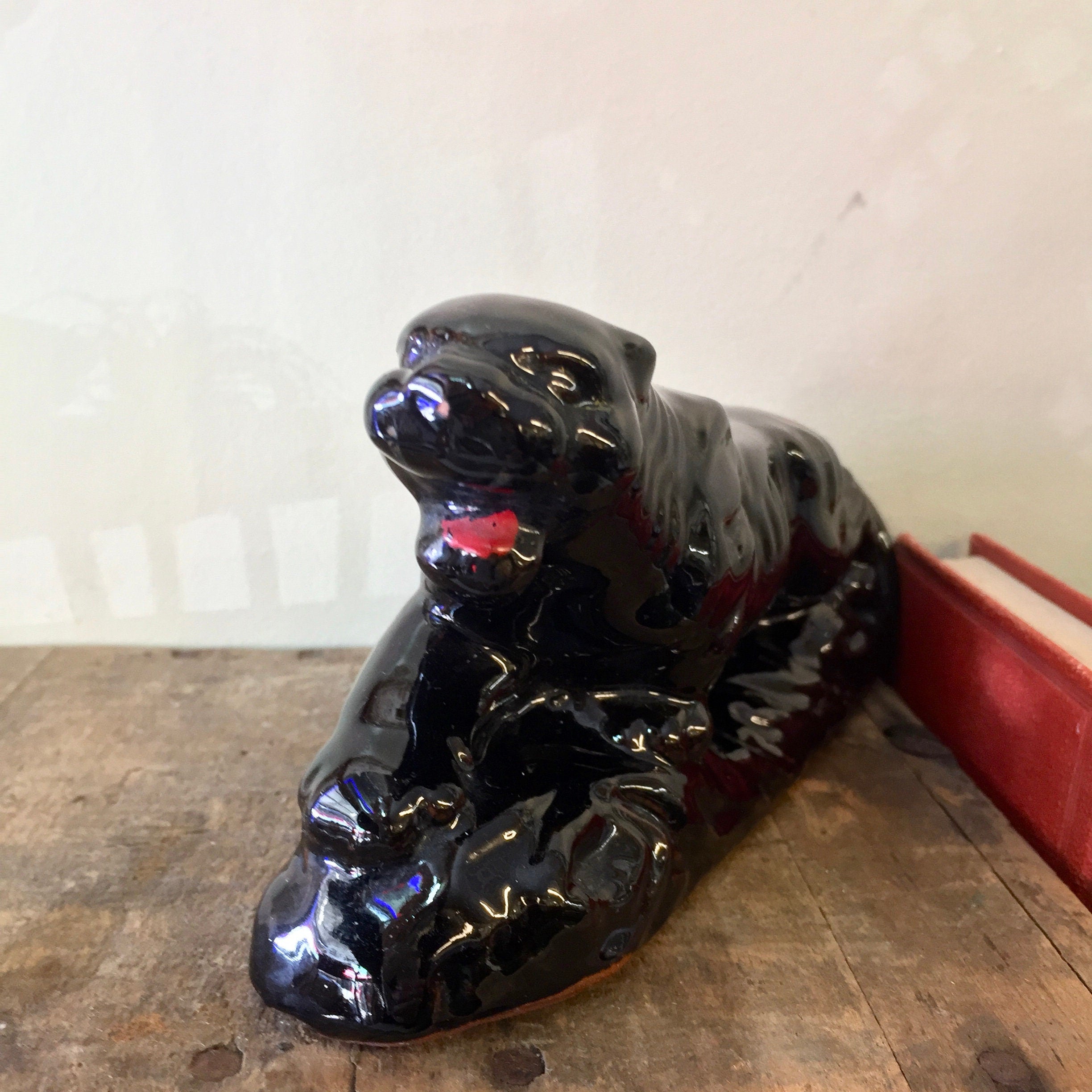 Vintage ceramic black panther figurine with glossy finish and red collar, made in Japan. Decorative small cat sculpture for home decor, mantlepiece, bookcase or cat lover gift.