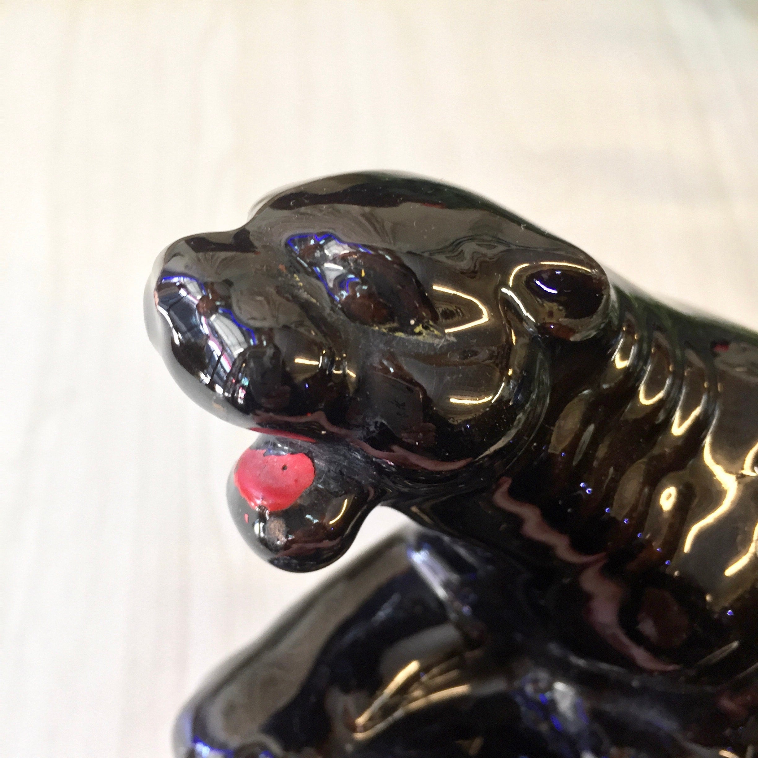 Vintage ceramic black panther figurine with red tongue, made in Japan. Small decorative cat statue for home decor, mantle, bookcase or cat lover gift.