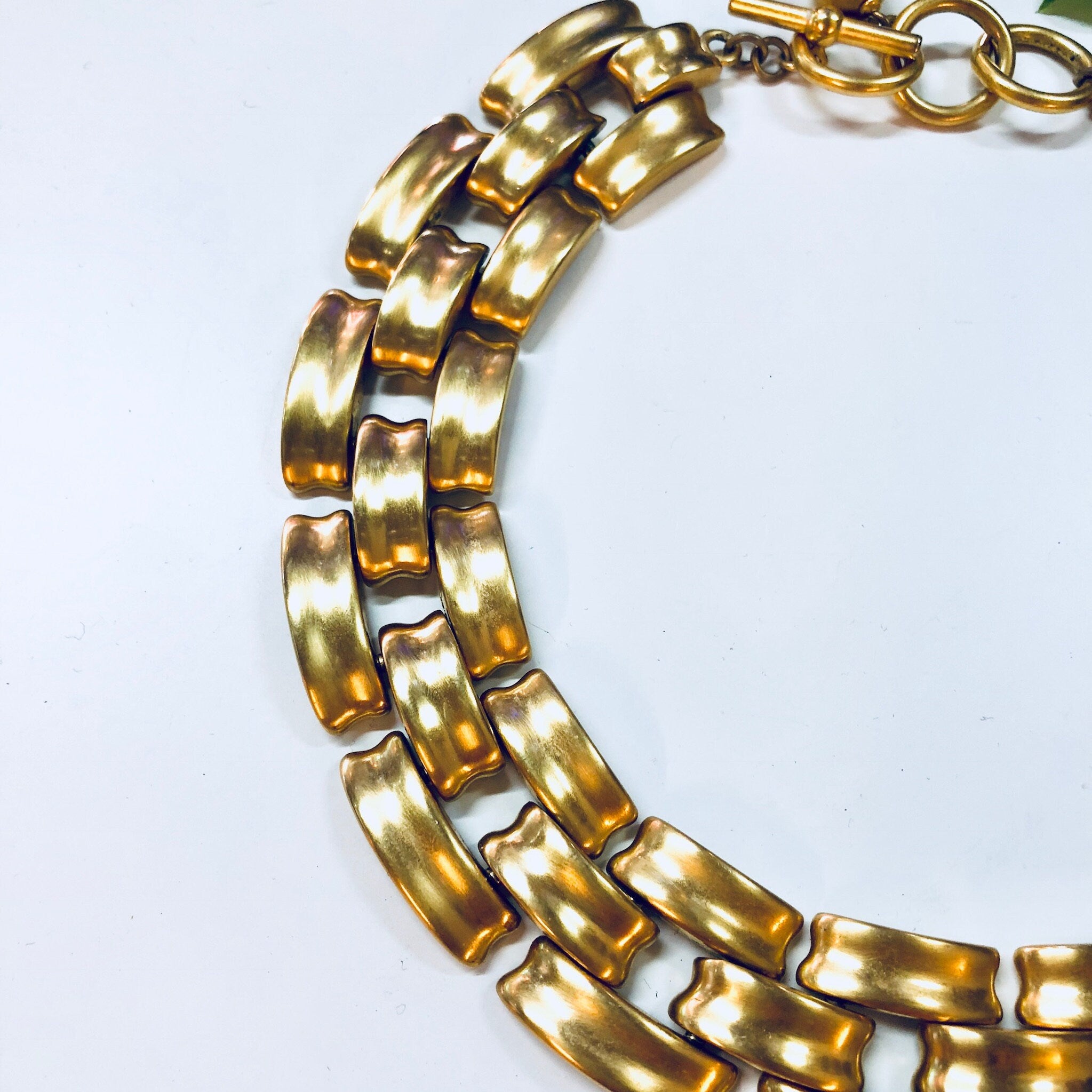 Vintage gold-toned chunky link choker necklace with toggle clasp by Anne Klein, a statement jewelry piece.