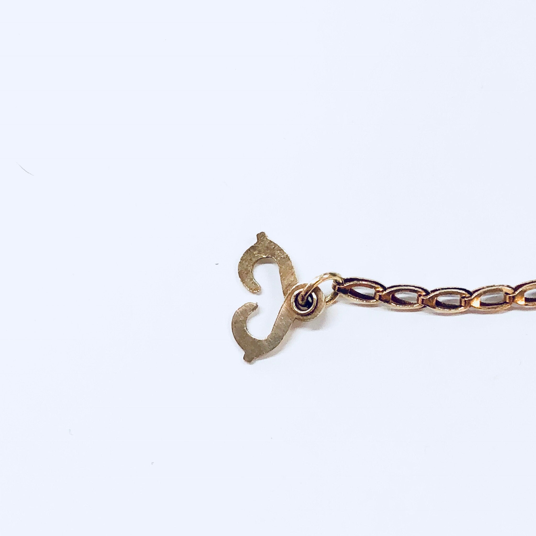 Vintage 14K gold chain link bracelet with blue and green iridescent natural stone charm
