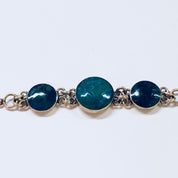 Vintage 14K gold link bracelet with blue and green iridescent natural stones, fine jewelry suitable for weddings.