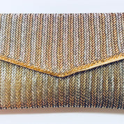 Vintage beaded envelope clutch purse with silver and gold beads, suitable for formalwear, weddings or special occasions.