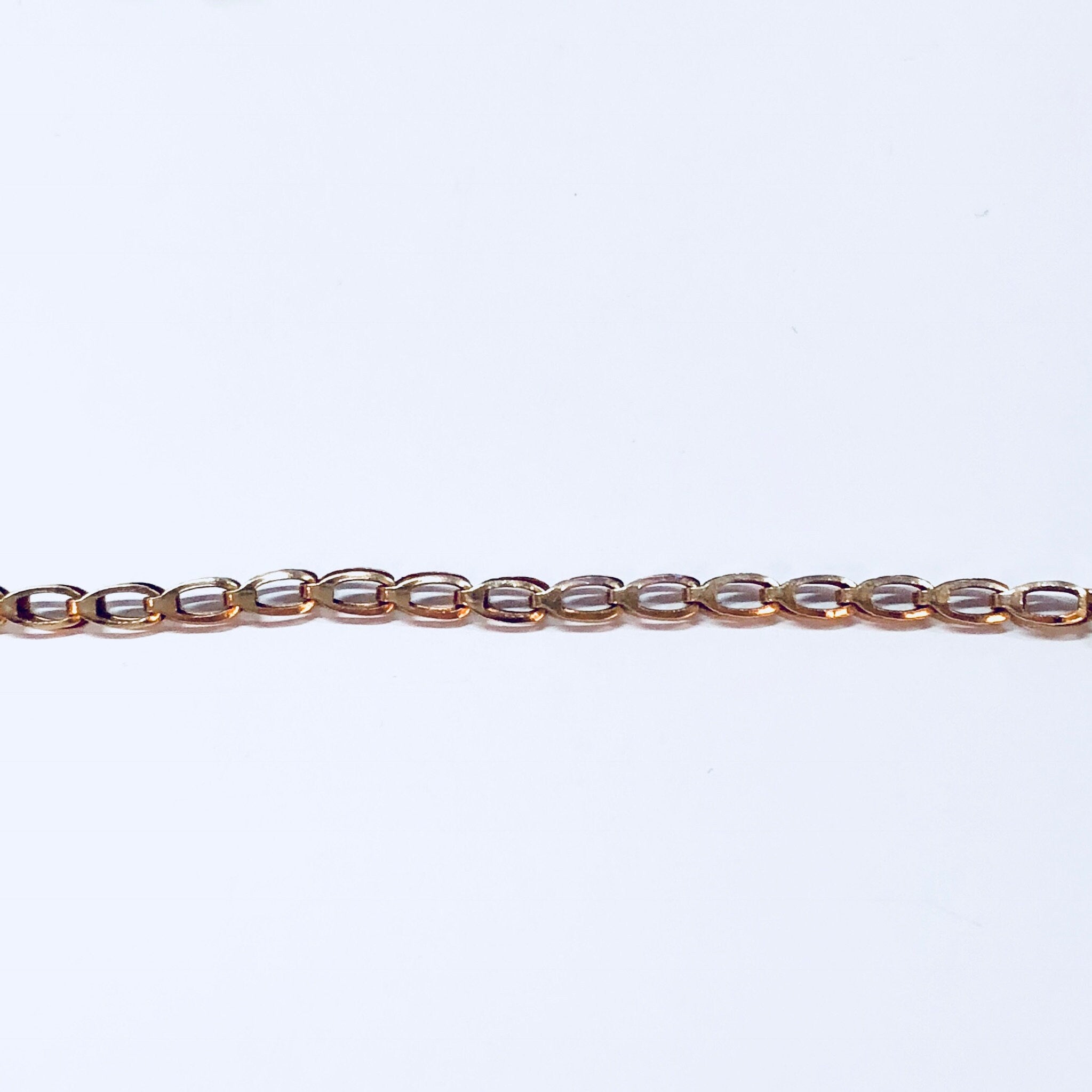 Vintage 14K gold link bracelet with blue, green and iridescent natural stones, fine jewelry suitable for weddings.