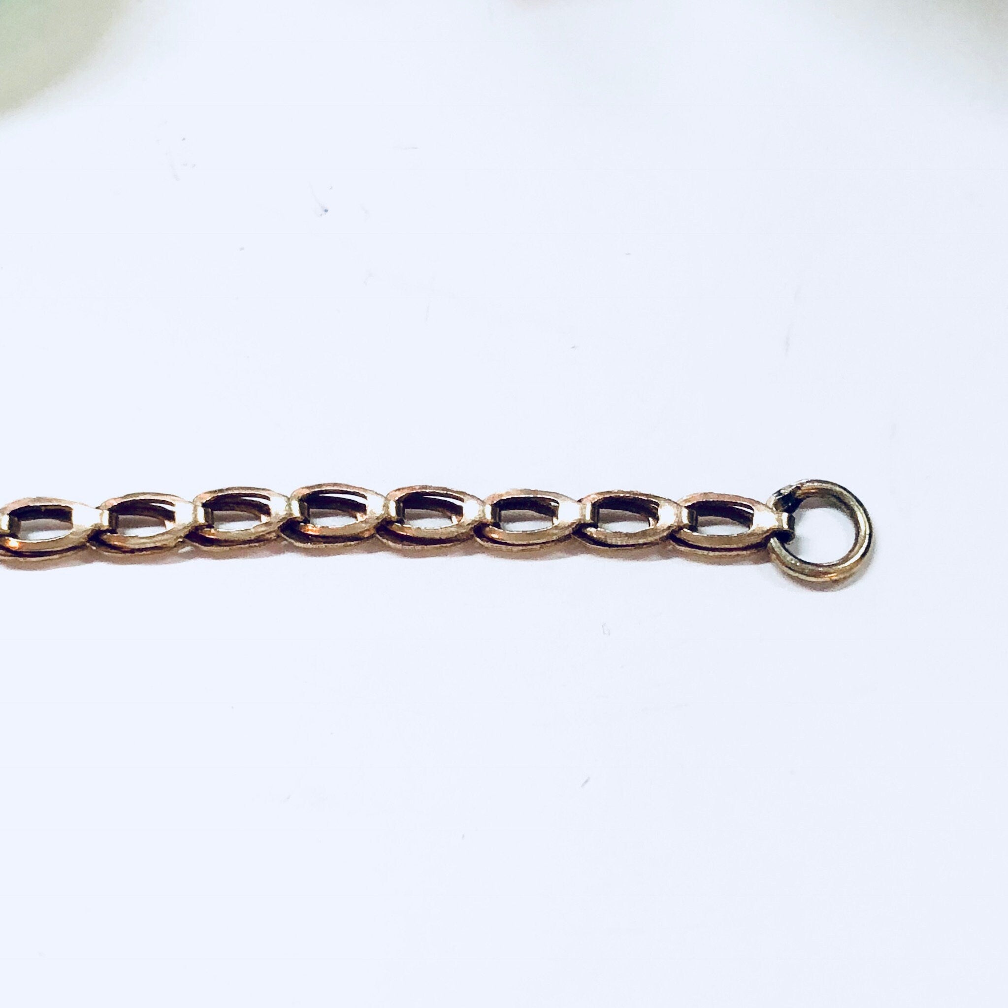 Vintage 14K gold link bracelet with iridescent blue and green natural stones