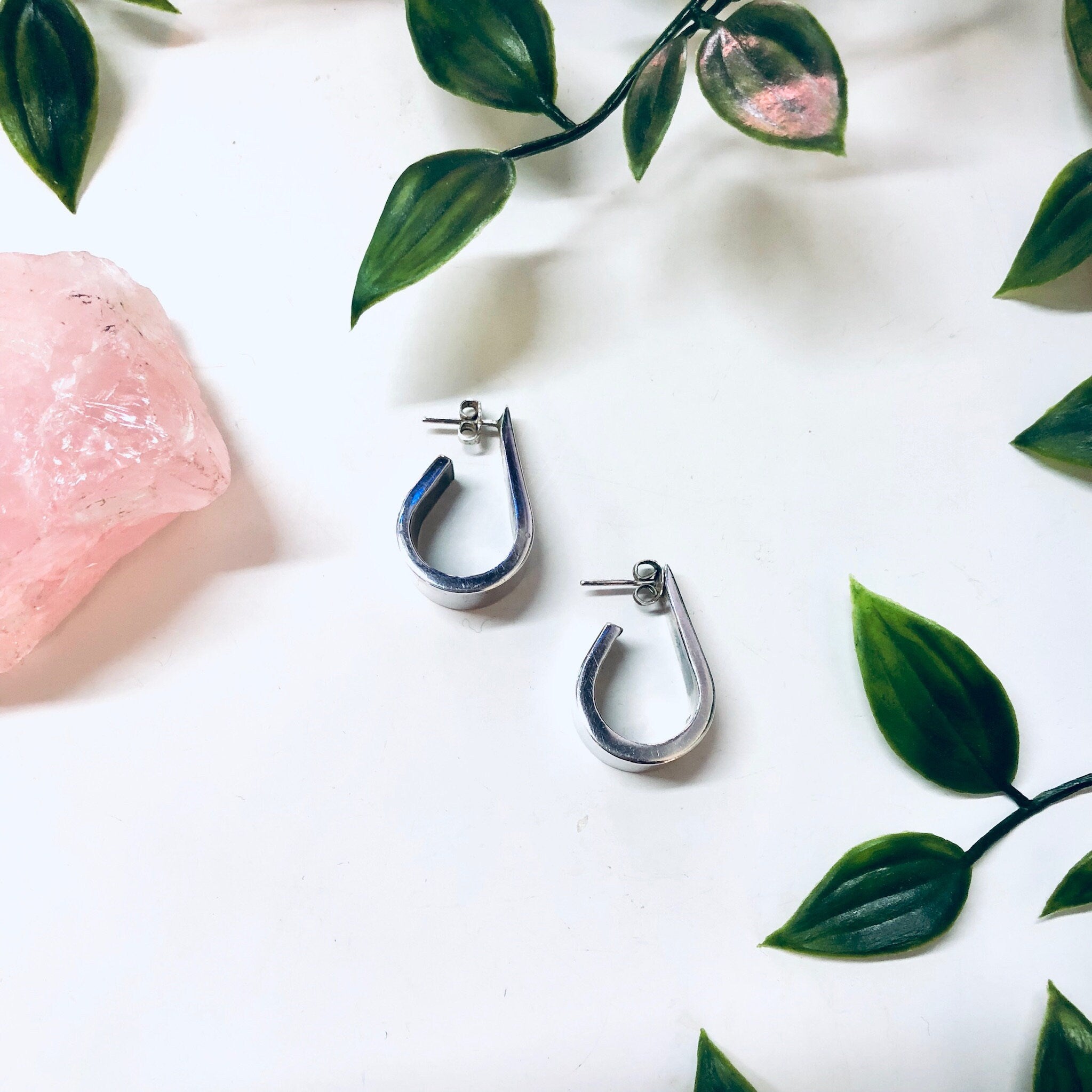Vintage Sterling Silver 925 Zina Modernist Thick Hoop Earrings on White Background with Green Leaves