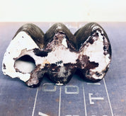 Three vintage ceramic monkey figurines depicting "see no evil, hear no evil, speak no evil" proverb, handmade in Japan, black and white coloring with distressed finish, decorative animal trinket for home decor.