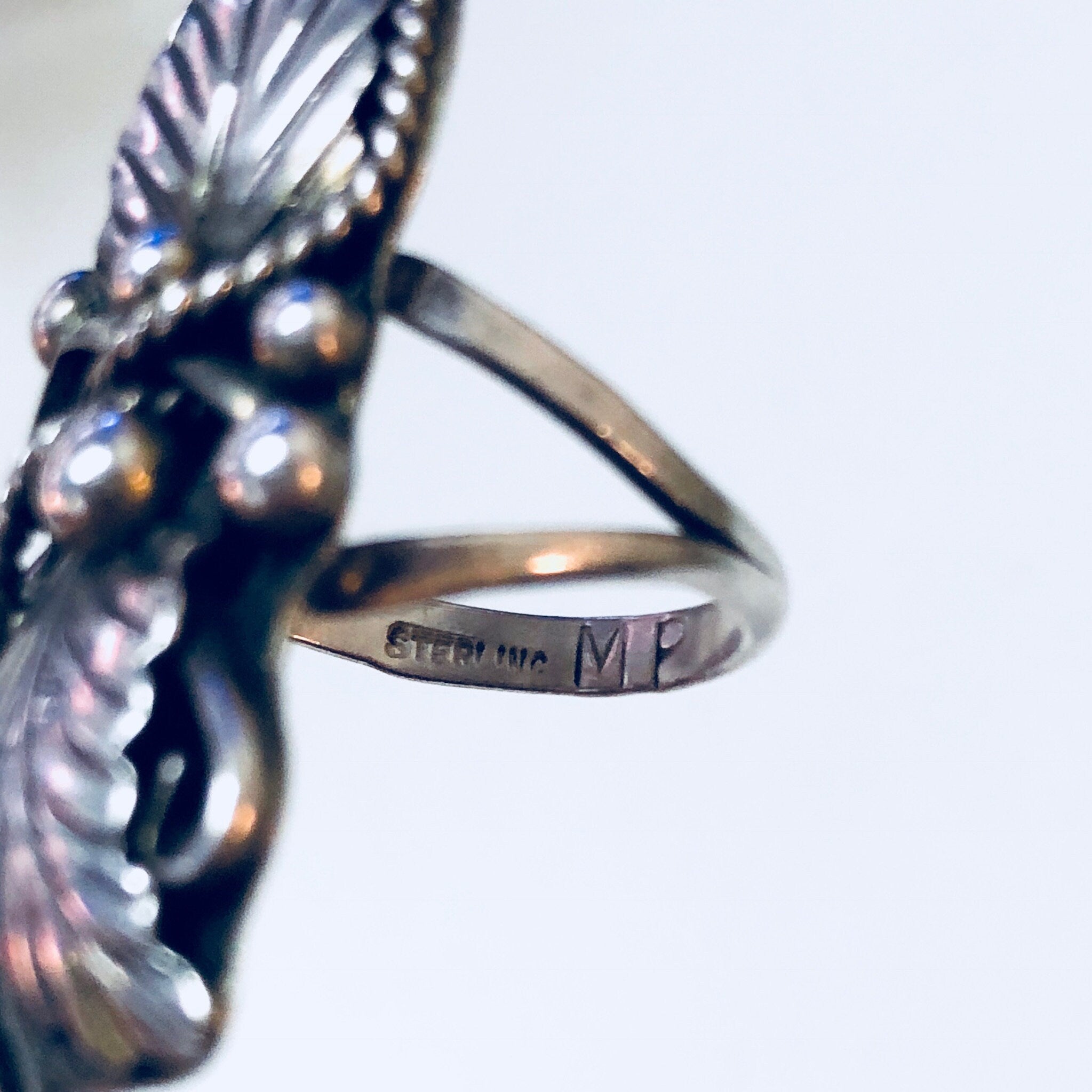 Vintage Southwestern Silver Ring with Feather Design