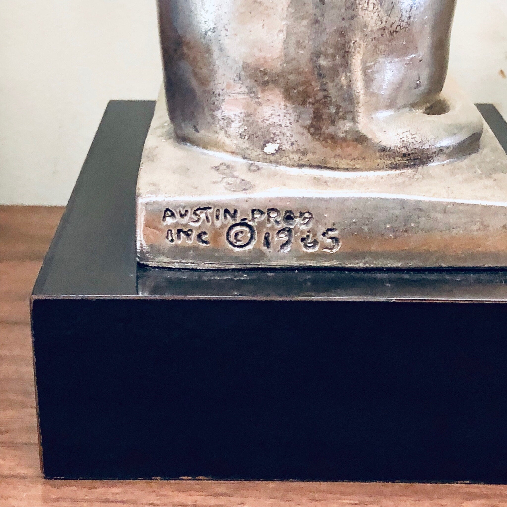 Silver cat statue on black wooden base, vintage home decor sculpture piece