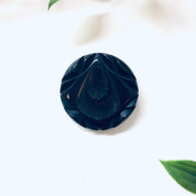 Vintage round black carved Bakelite mourning brooch from the 1930s