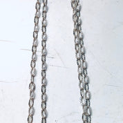 Vintage silver chain necklace with intricate oval-shaped pendants resembling pentagrams or Baphomet symbols, creating a gothic or witchy aesthetic suitable for Valentine's Day or everyday wear.