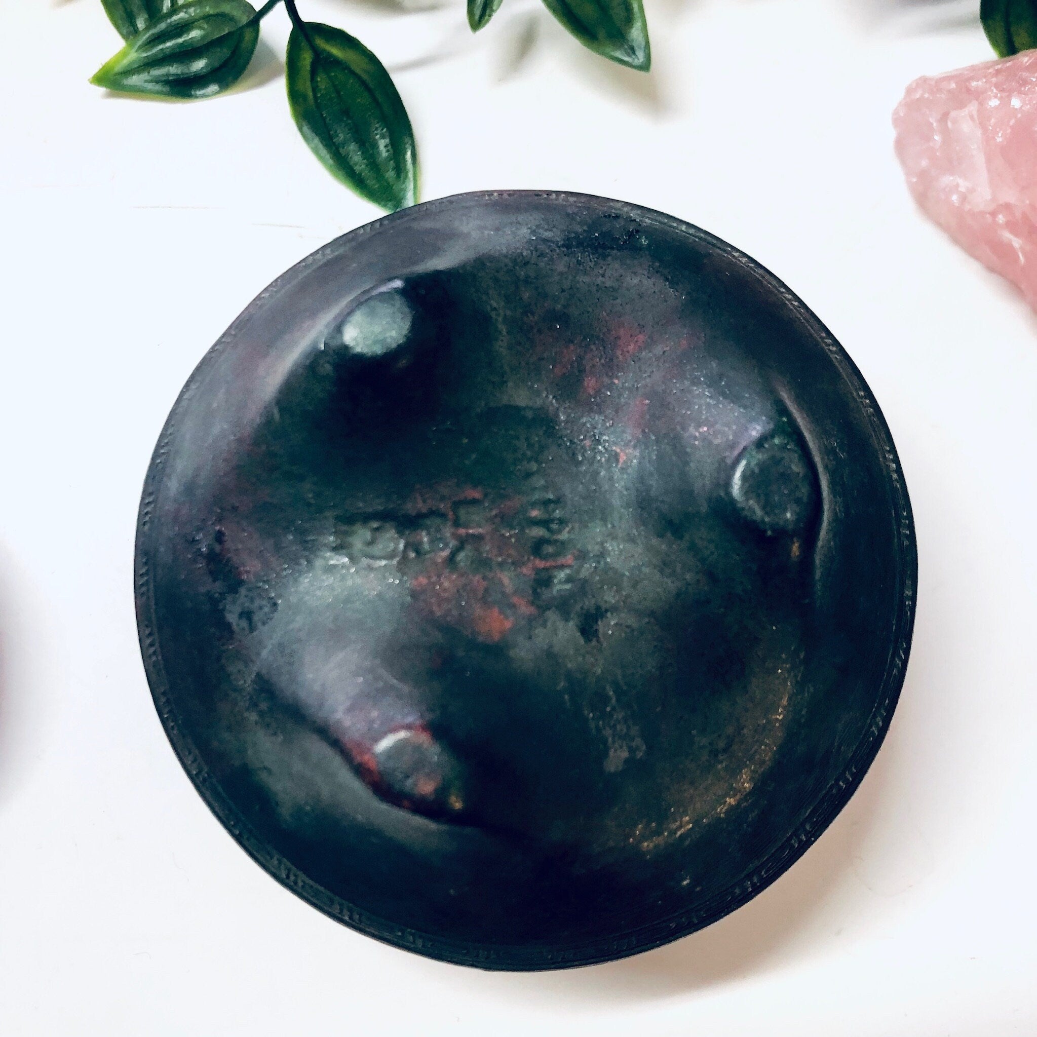 Vintage teal and rust colored lidded ceramic incense holder surrounded by green leaves, unique floral design home decor or housewarming gift idea.