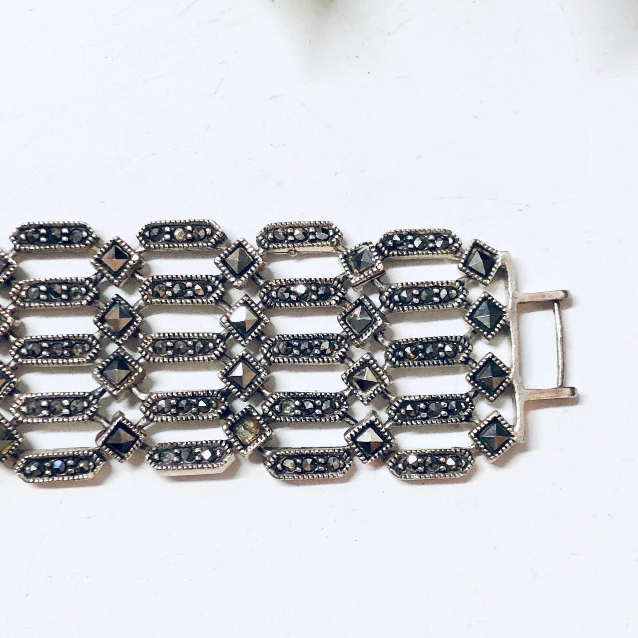 Vintage sterling silver marcasite link bracelet, statement jewelry piece suitable for Valentine's Day gift or special occasion.