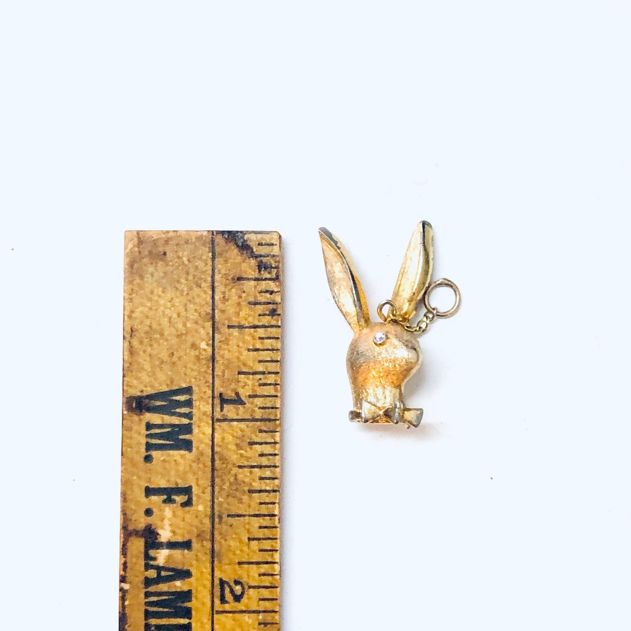 Vintage gold-toned Playboy bunny rabbit pendant charm for necklace or dangle pendant