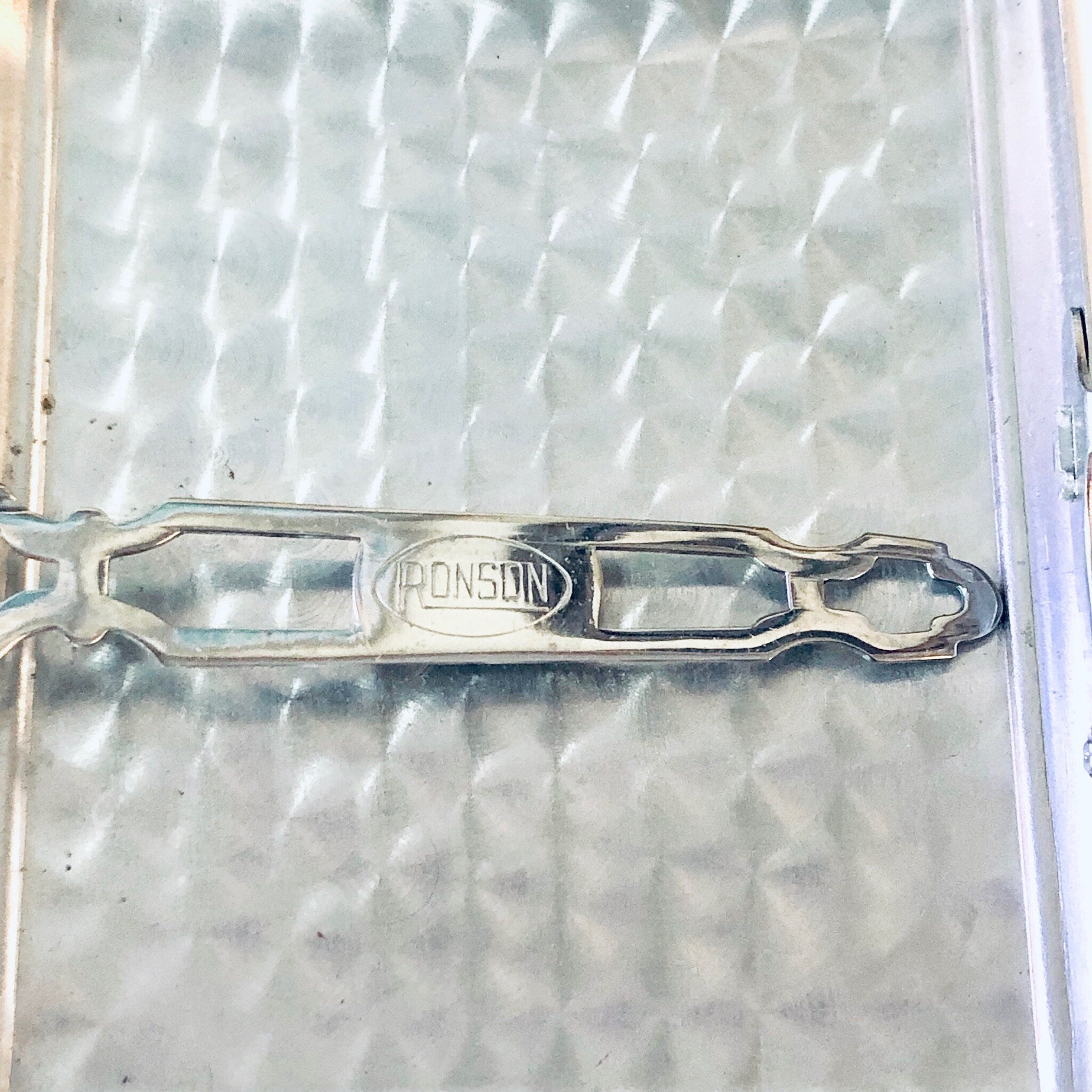 Vintage silver Ronson cigarette case and lighter with Art Deco design, monogrammed on the case.