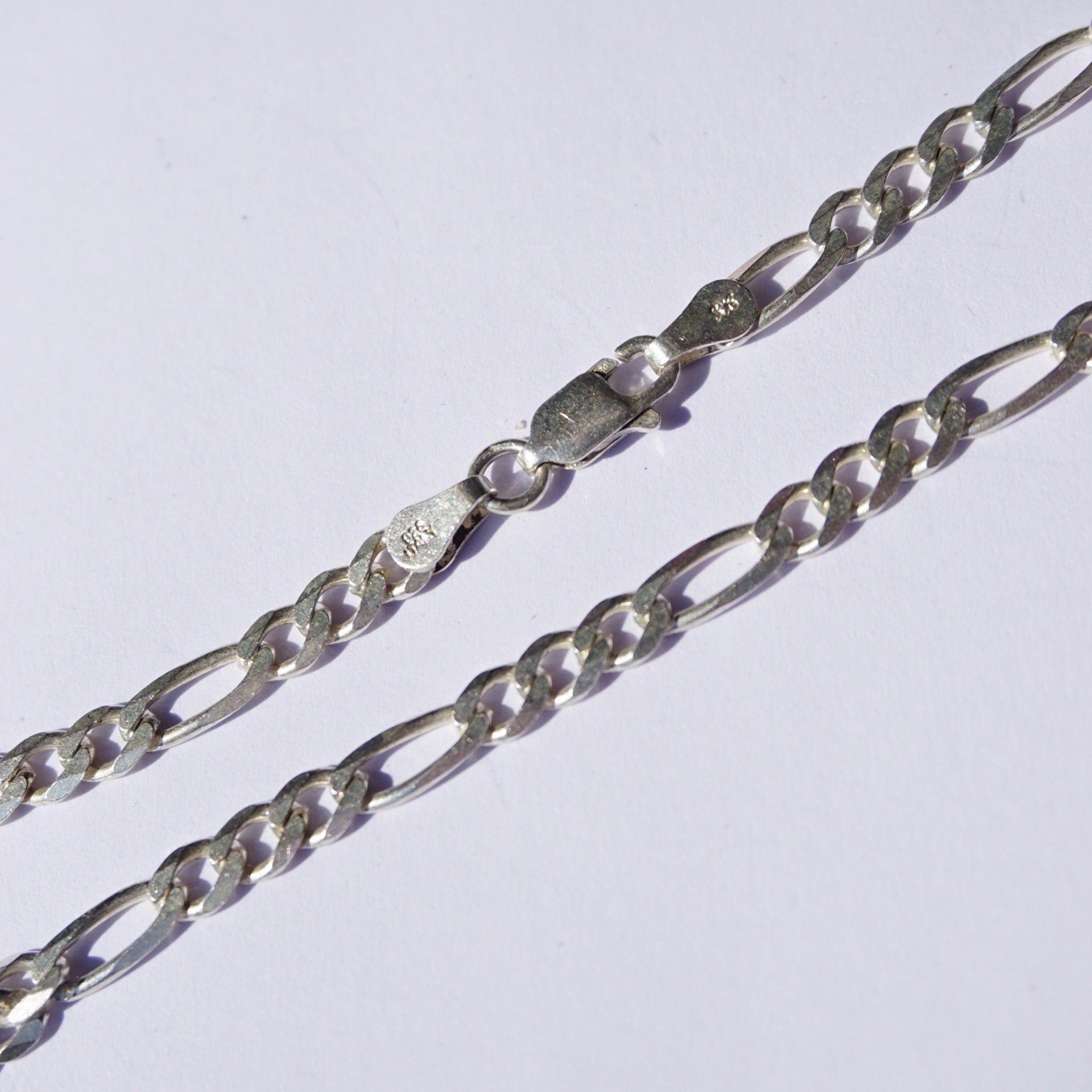Vintage sterling silver Figaro chain necklace, 34 inches long, made in Italy, 925 stamp, suitable for layering or wearing alone.