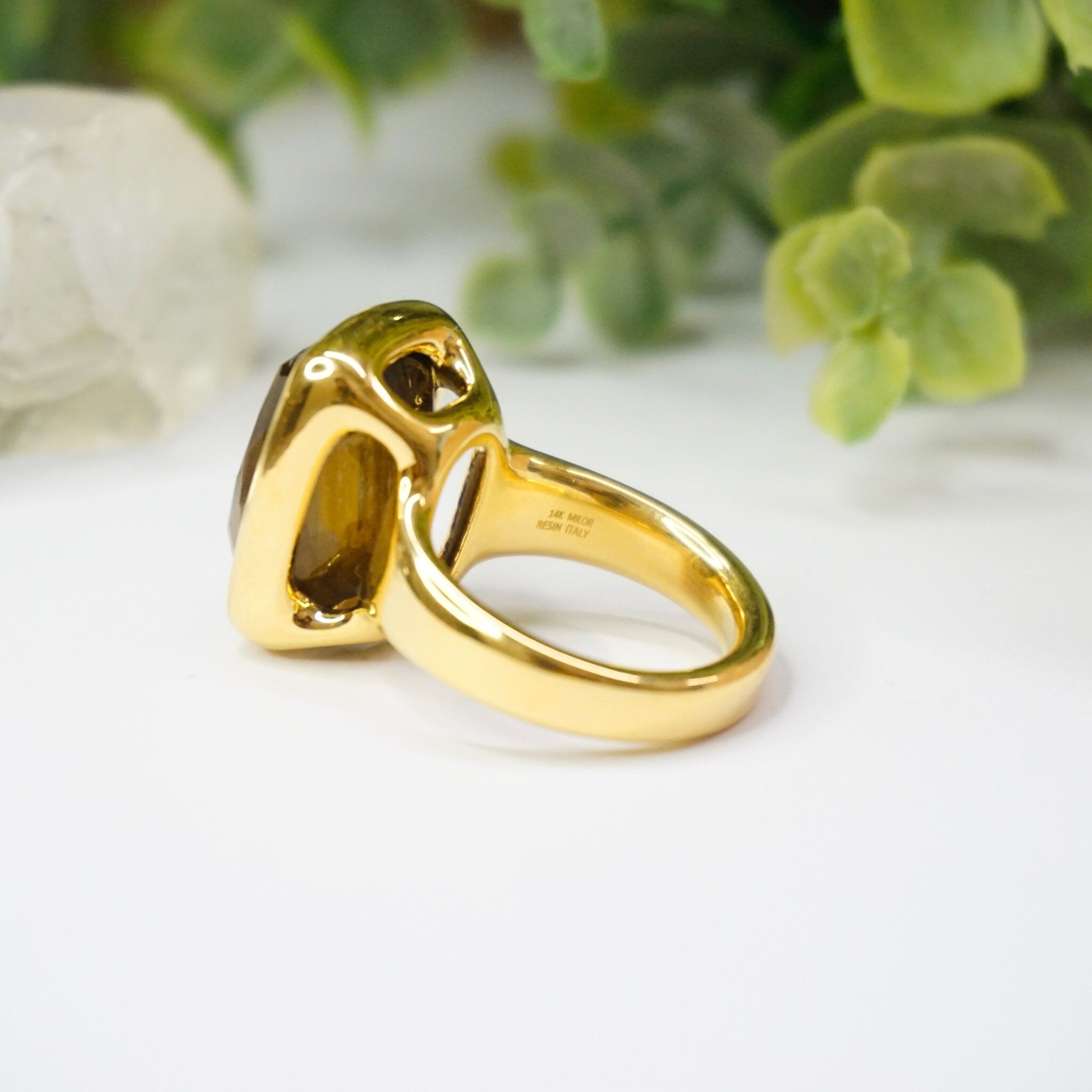 Vintage 14K gold tiger's eye ring featuring a large, rectangle cut tiger's eye stone set in a polished gold setting, crafted by Milor Italy using 14K gold over resin.