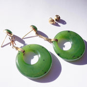 Vintage 14K gold jade dangle earrings with green jade hoops and Chinese character studs, natural jade, on white background
