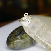 Vintage sterling silver ankh ring on polished stone