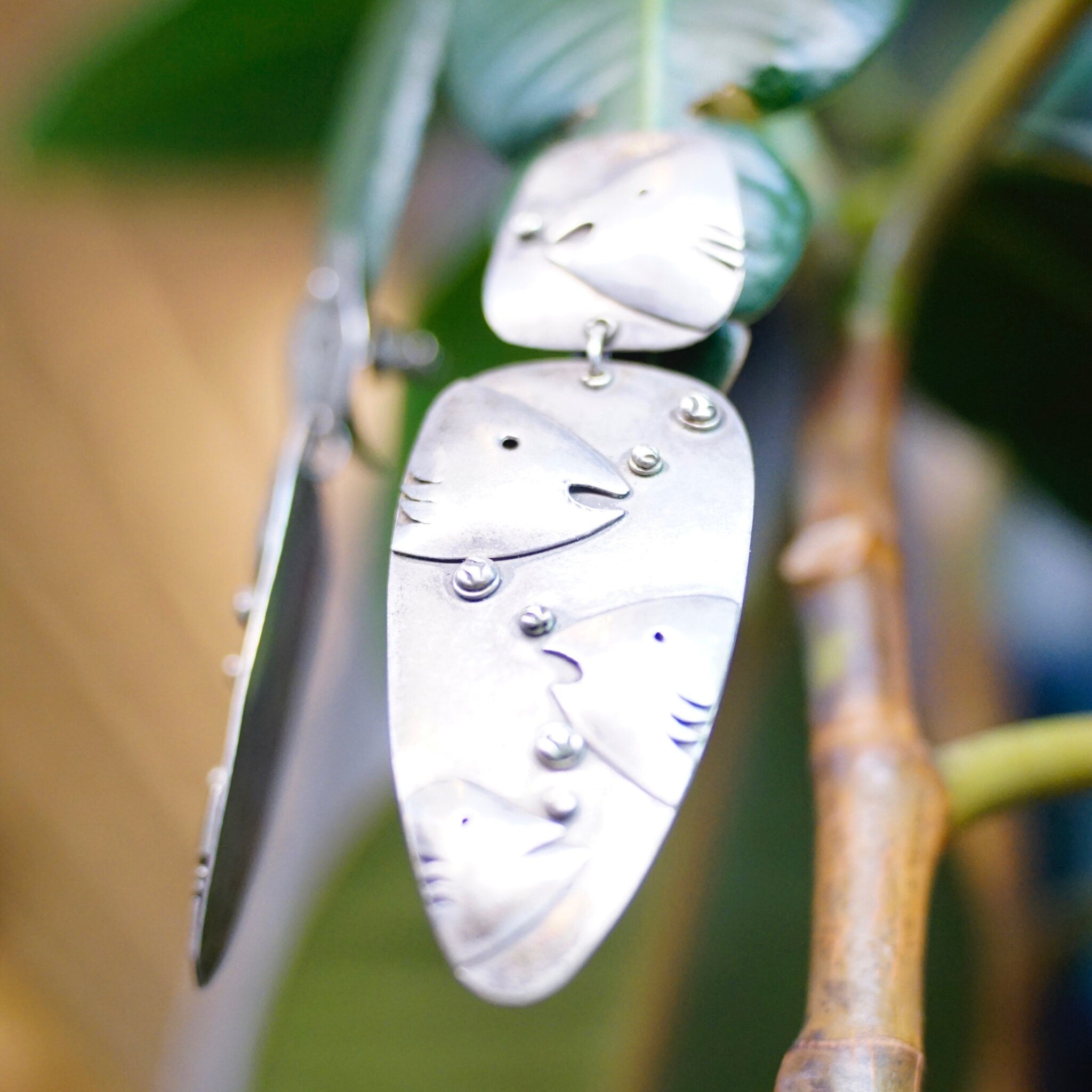 Vintage sterling silver underwater fish earrings featuring unique embossed fish and bubble design on long dangling silver panels, 925 silver.