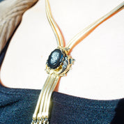 Vintage Gold Tone Cameo Necklace, Unique Bolo Tie Necklace With Gold Tassels, Embossed Hematite Cameo Pendant, 2-Strand Herringbone Chain
