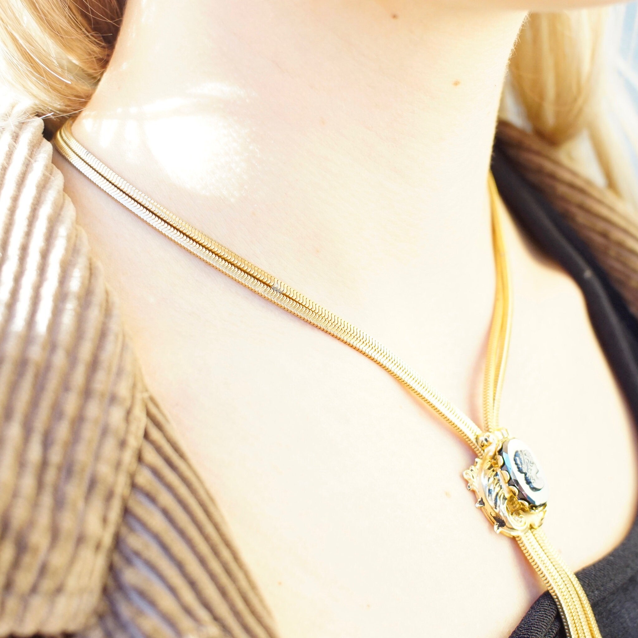 Vintage Gold Tone Cameo Necklace, Unique Bolo Tie Necklace With Gold Tassels, Embossed Hematite Cameo Pendant, 2-Strand Herringbone Chain