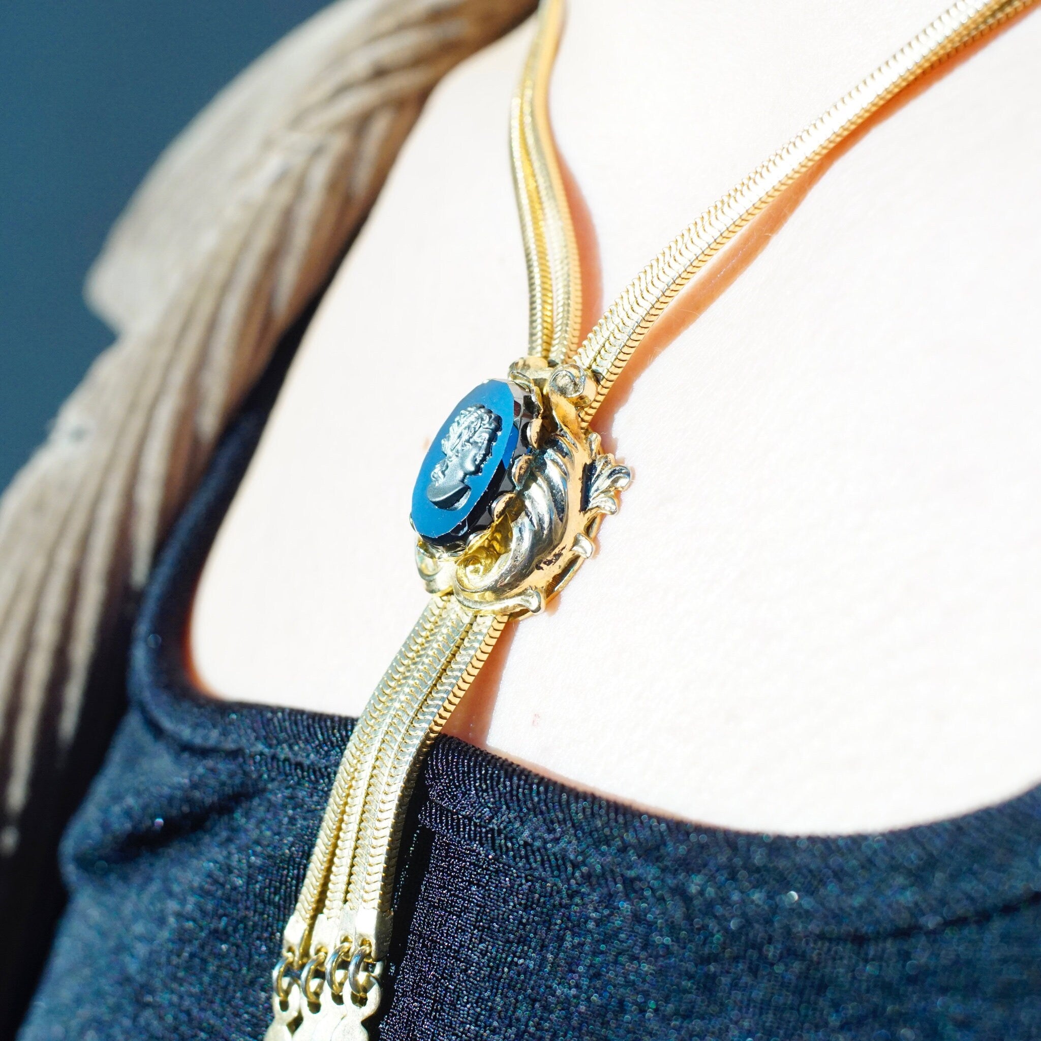 Vintage Gold Tone Cameo Necklace, Unique Bolo Tie Necklace With Gold Tassels, Embossed Hematite Cameo Pendant, 2-Strand Herringbone Chain