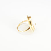 Vintage 14K gold cameo ring with diamond accent, featuring an intricately carved shell cameo in an ornate gold setting, ring size 3 3/4 US.