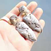 Vintage Sterling Silver Underwater Fish Earrings, Unique Silver Panel Earrings With Embossed Fish & Bubble Design held in palm of hand