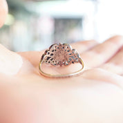 Vintage ornate sterling silver ring with iridescent blue glass stone, featuring hammered and textured silver design. Size 9 1/4 US.