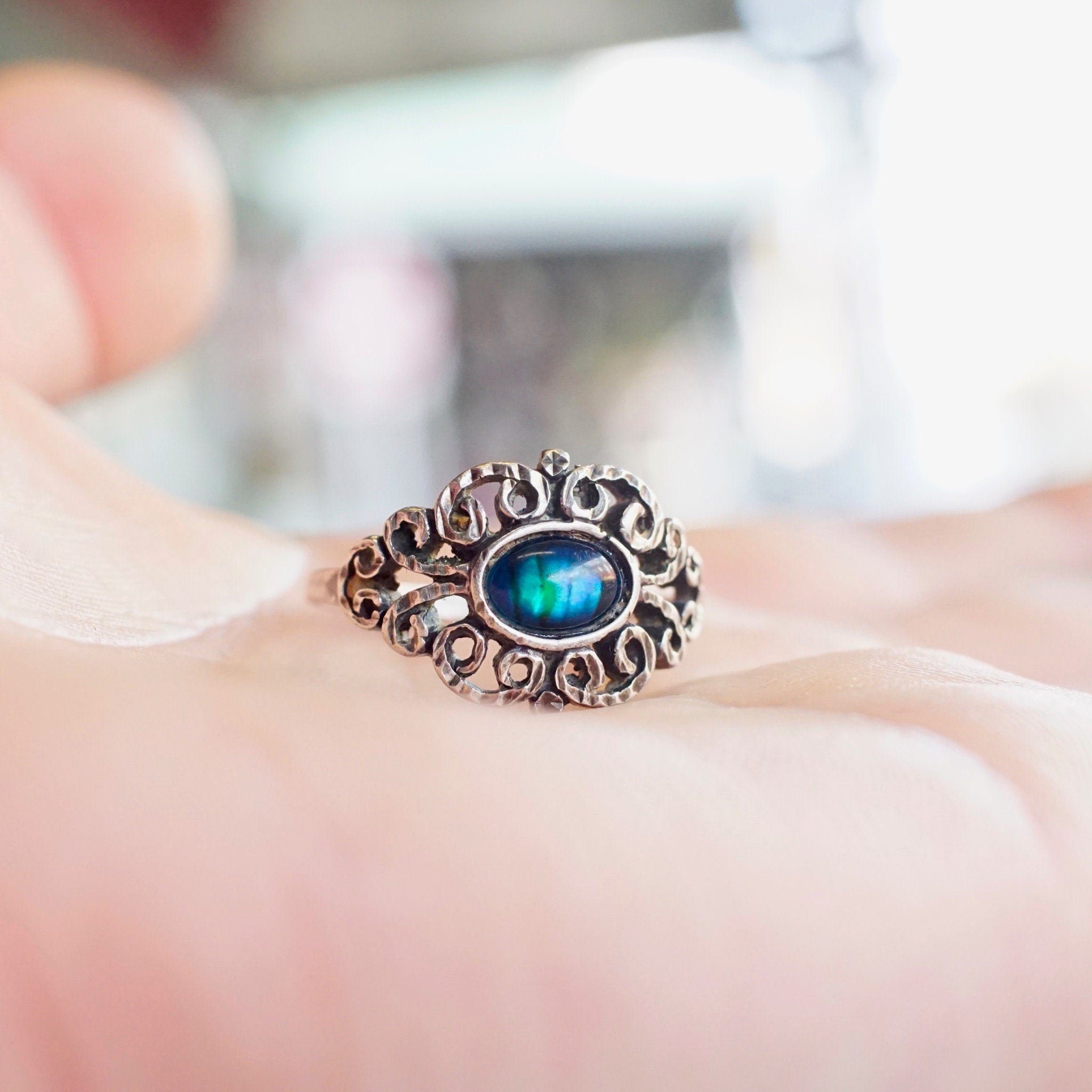 Vintage ornate sterling silver ring with iridescent blue glass stone, hammered textured design, size 9 1/4 US