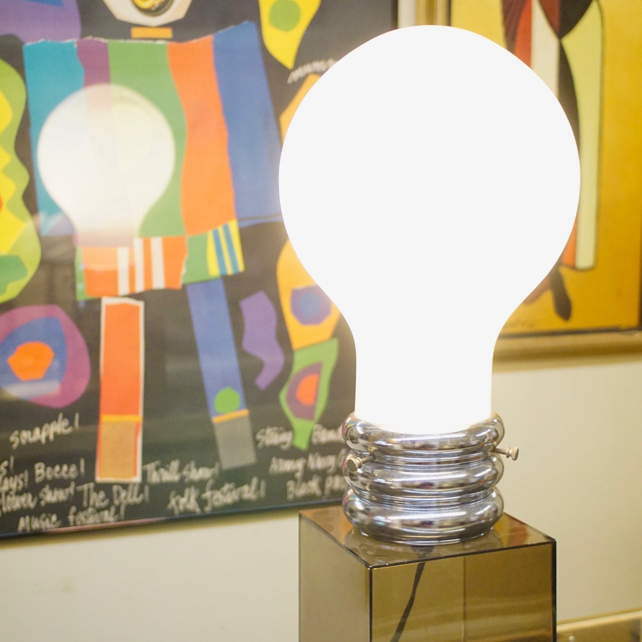 Contemporary Pop Art Chrome Glass Light Bulb Table Lamp, Vintage Lamp With Giant Light Bulb & Semi-Translucent Plastic Base, 21" Tall