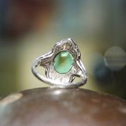 Vintage 18K white gold Art Deco filigree ring with matte green turquoise cabochon and diamond accents, size 7 3/4 US.