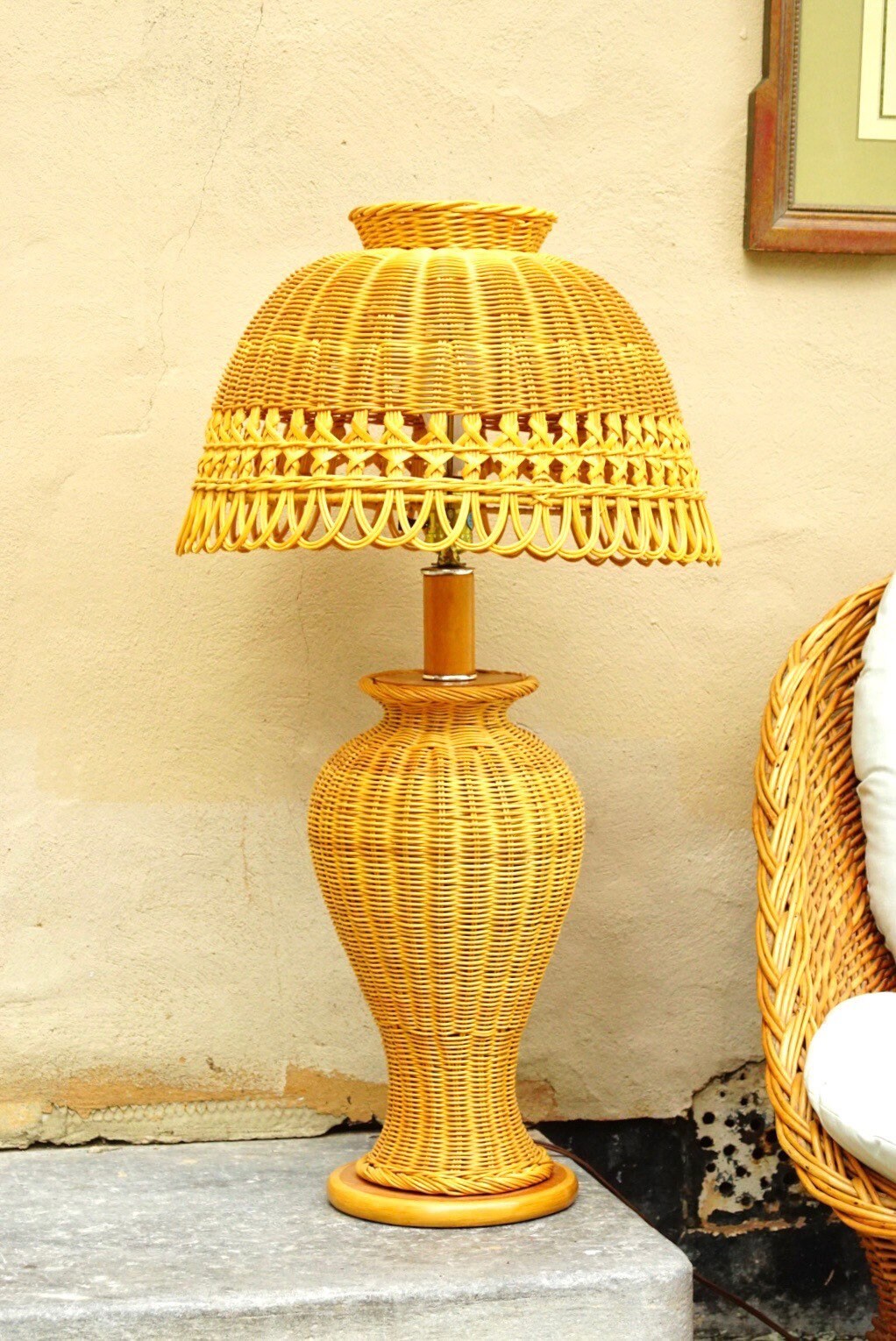 Vintage mid-century modern wicker table lamp with matching wicker shade, featuring an intricate weave pattern in natural honey color, measuring 29 inches tall and 16 inches wide, in great condition, available for local pickup in Philadelphia.