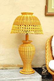Vintage mid-century modern wicker table lamp with matching wicker shade, featuring an intricate weave pattern in natural honey color, measuring 29 inches tall and 16 inches wide, in great condition, available for local pickup in Philadelphia.