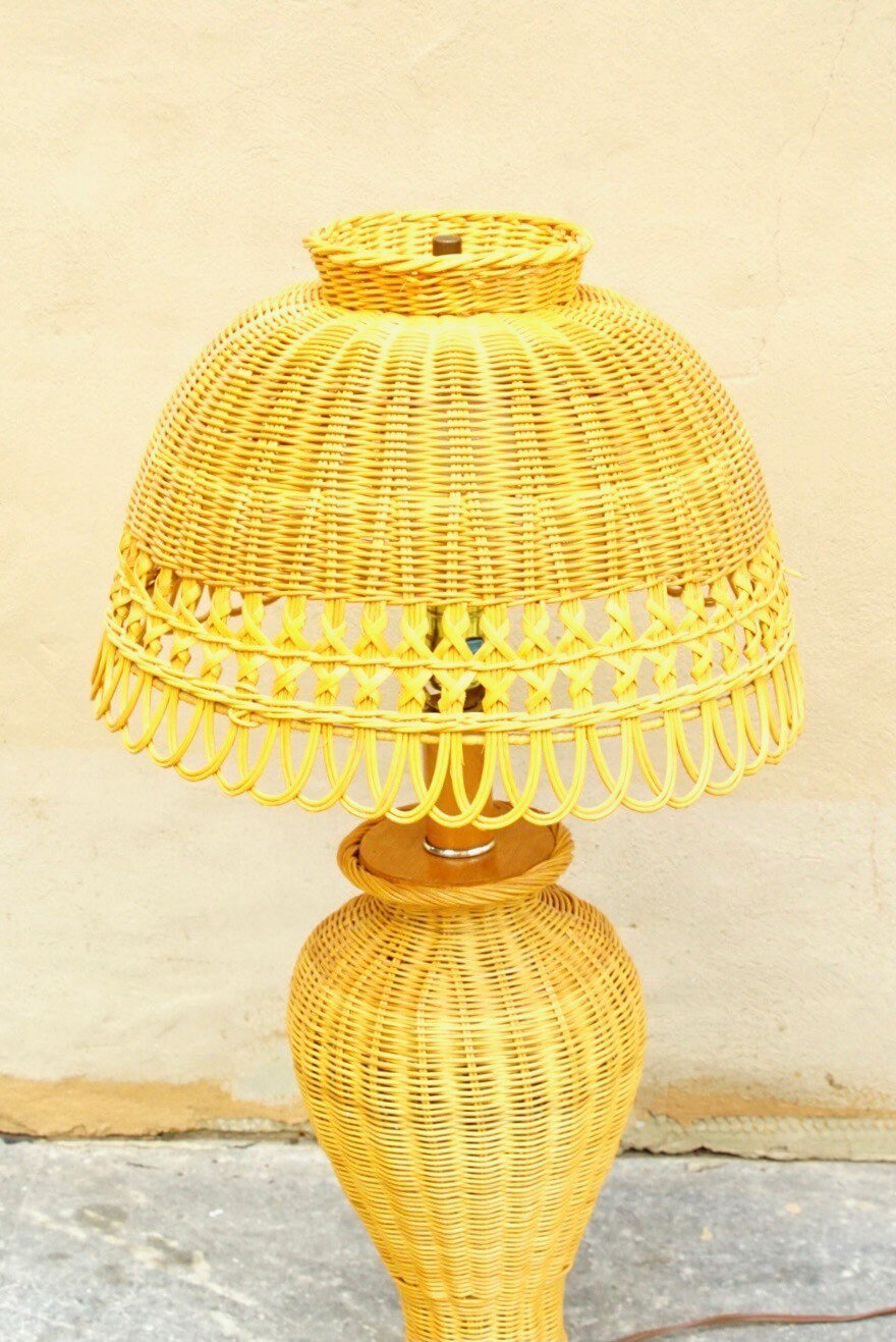Vintage mid-century modern wicker table lamp with natural wicker base and matching wicker shade, in great condition, measuring 29 inches tall and 16 inches wide, available for pickup in Philadelphia.
