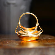 10K yellow gold Victorian cameo ring with large classic relief cameo in ornate gold scroll setting, size 7 1/2 US