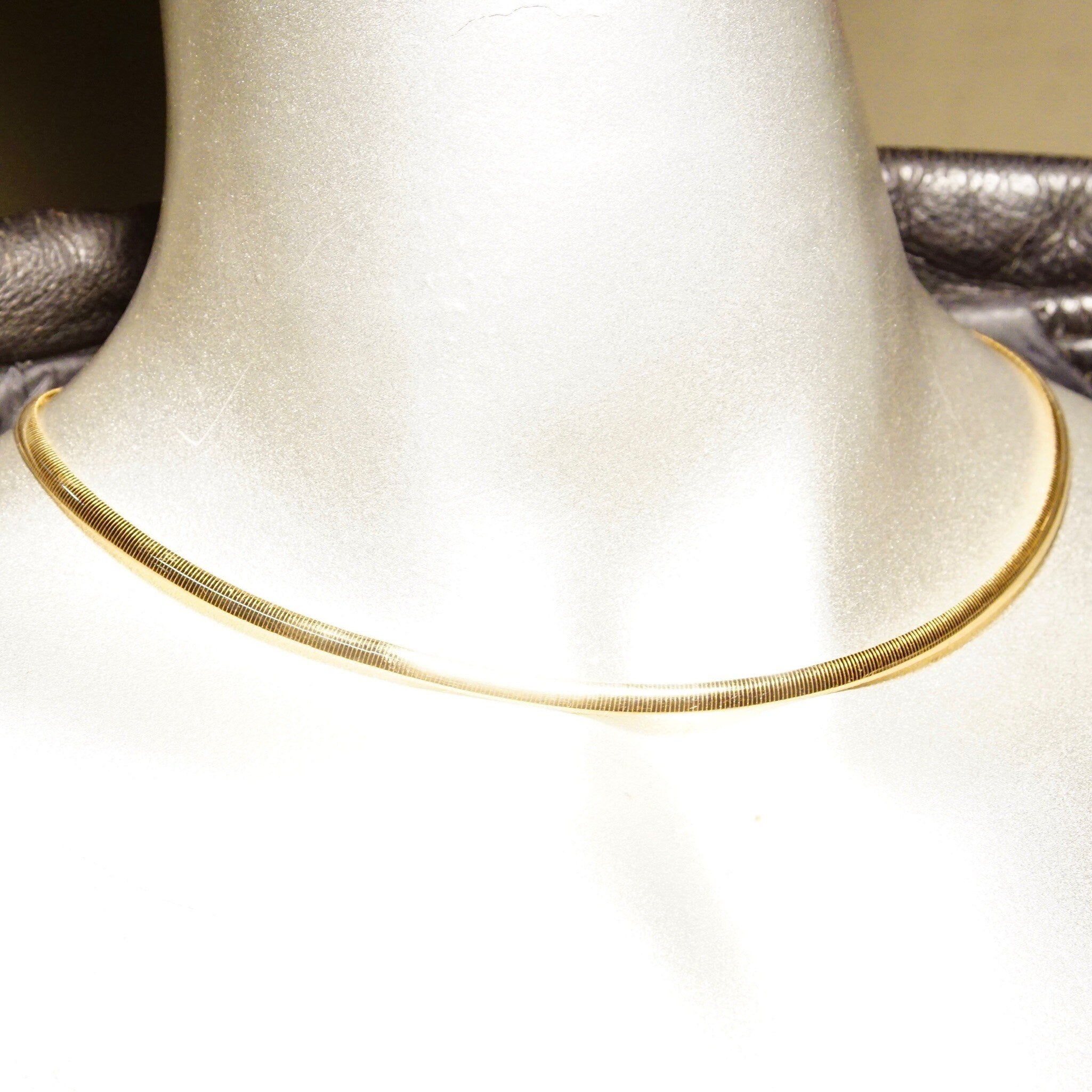 Vintage 14K yellow gold Italian omega collar necklace with minimalist design, 4mm wide, 16 inches long, lustrous finish, stamped 585 for 14K gold purity, made in Italy.