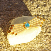 Vintage 14K rose gold Art Deco bar pin brooch with brilliant blue aquamarine gemstone in golden ray setting, measuring 2 inches long, 585 fine jewelry.