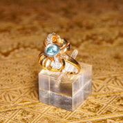 Antique 10K Gold Blue Topaz Diamond Bow Ring, JR Woods & Sons, Brilliant Blue Gemstone, Ribbon Setting, White Gold Accents, Size 6 3/4 US