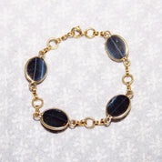 Vintage Art Deco 10K GF Black/Blue Cat's Eye Cabochon Link Bracelet, Chatoyant Glass Gemstones, Yellow Gold Links, Scarab Style, 7 3/4" L