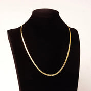 14K yellow gold Italian herringbone chain necklace with diamond-cut texture, reversible design, and 3.5mm width, displayed on a black jewelry bust against a white background.