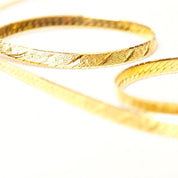 14K yellow gold Italian modernist herringbone chain necklace with diamond-cut texture and reversible design, 3.5mm wide, 20 inches long.