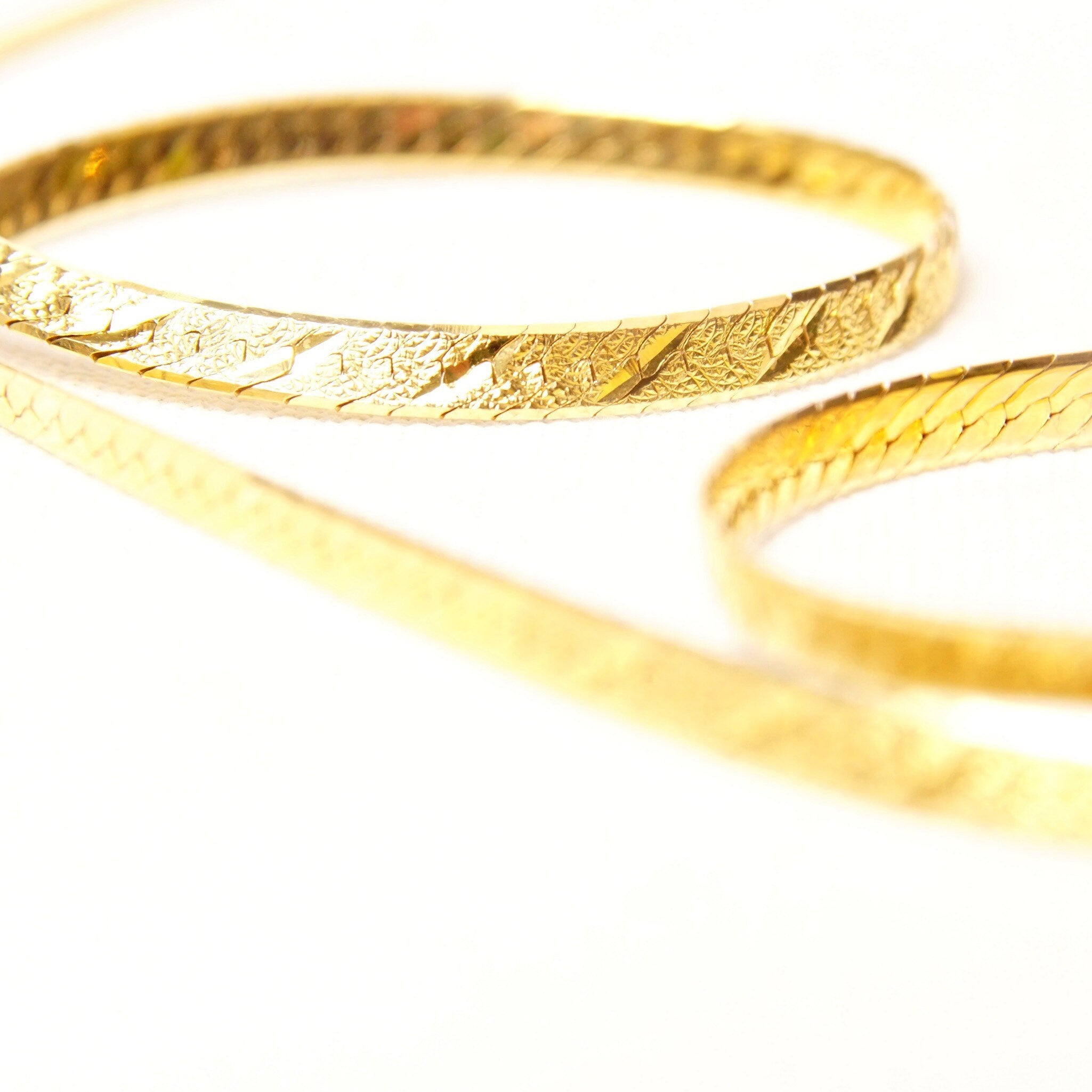 14K yellow gold Italian modernist herringbone chain necklace with diamond-cut texture and reversible design, 3.5mm wide, 20 inches long.