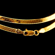 14K yellow gold herringbone chain necklace with diamond-cut texture, reversible design, and lobster claw clasp closure, measuring 3.5mm wide and 20 inches long.