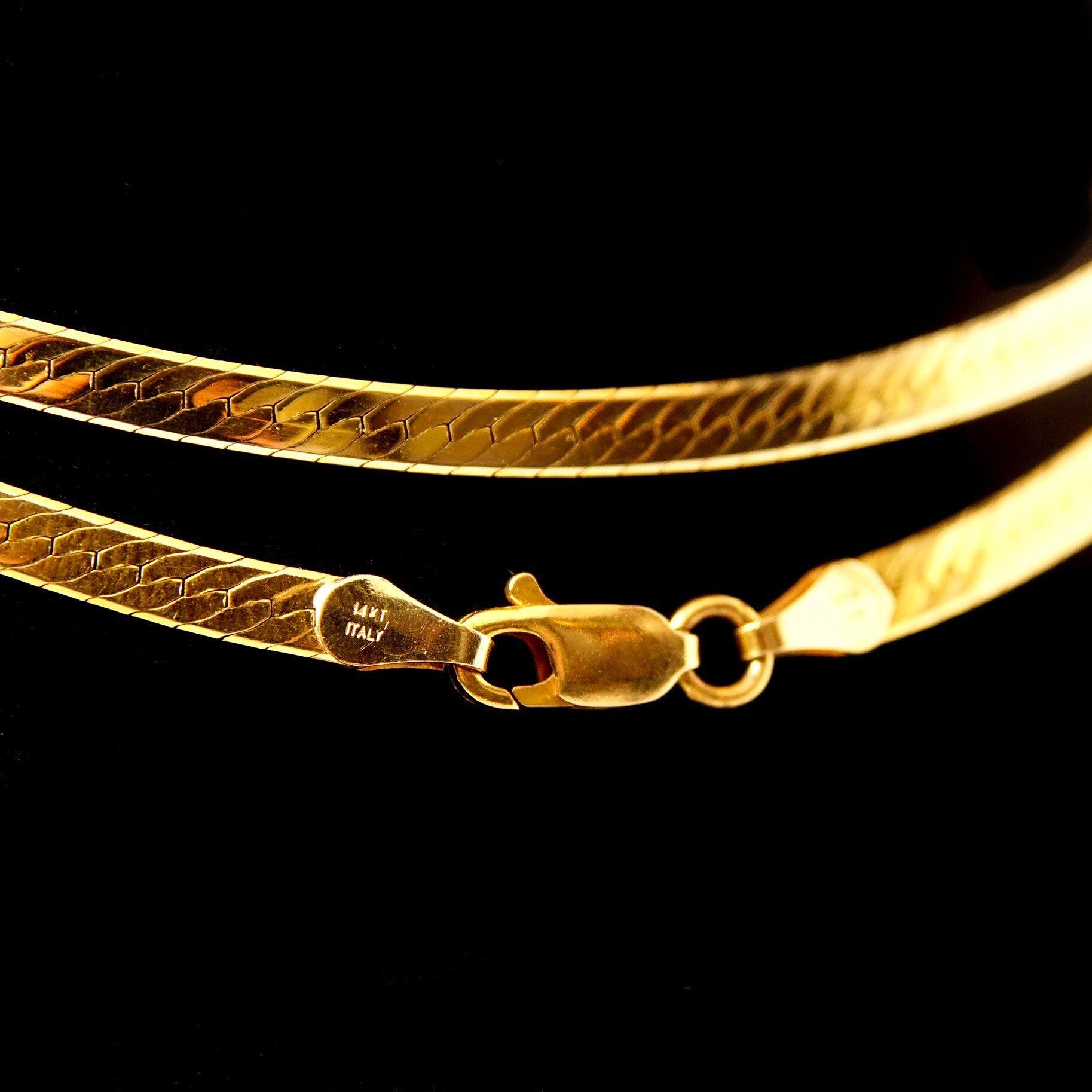14K yellow gold herringbone chain necklace with diamond-cut texture, reversible design, and lobster claw clasp closure, measuring 3.5mm wide and 20 inches long.
